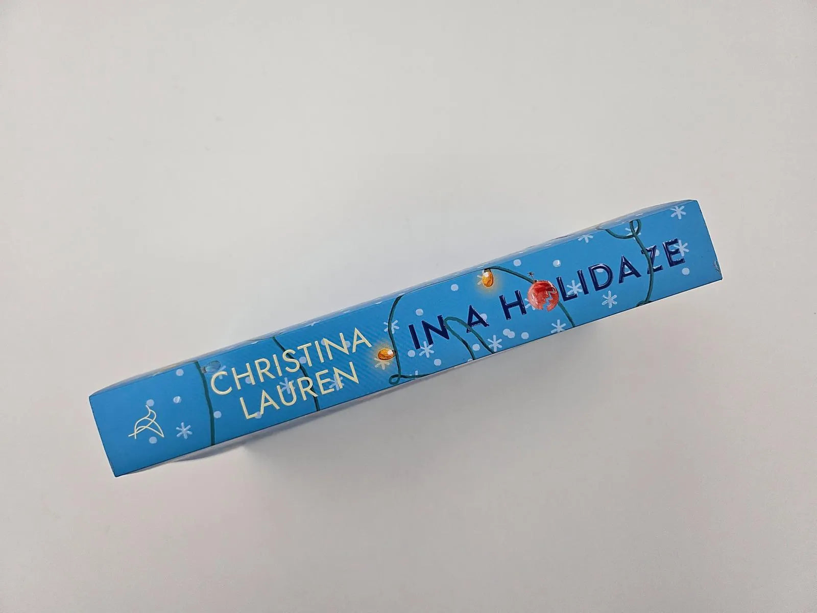 Christina Lauren - In a Holidaze – Ihr Weihnachtswunsch führt zu Gefühlschaos unterm Mistelzweig