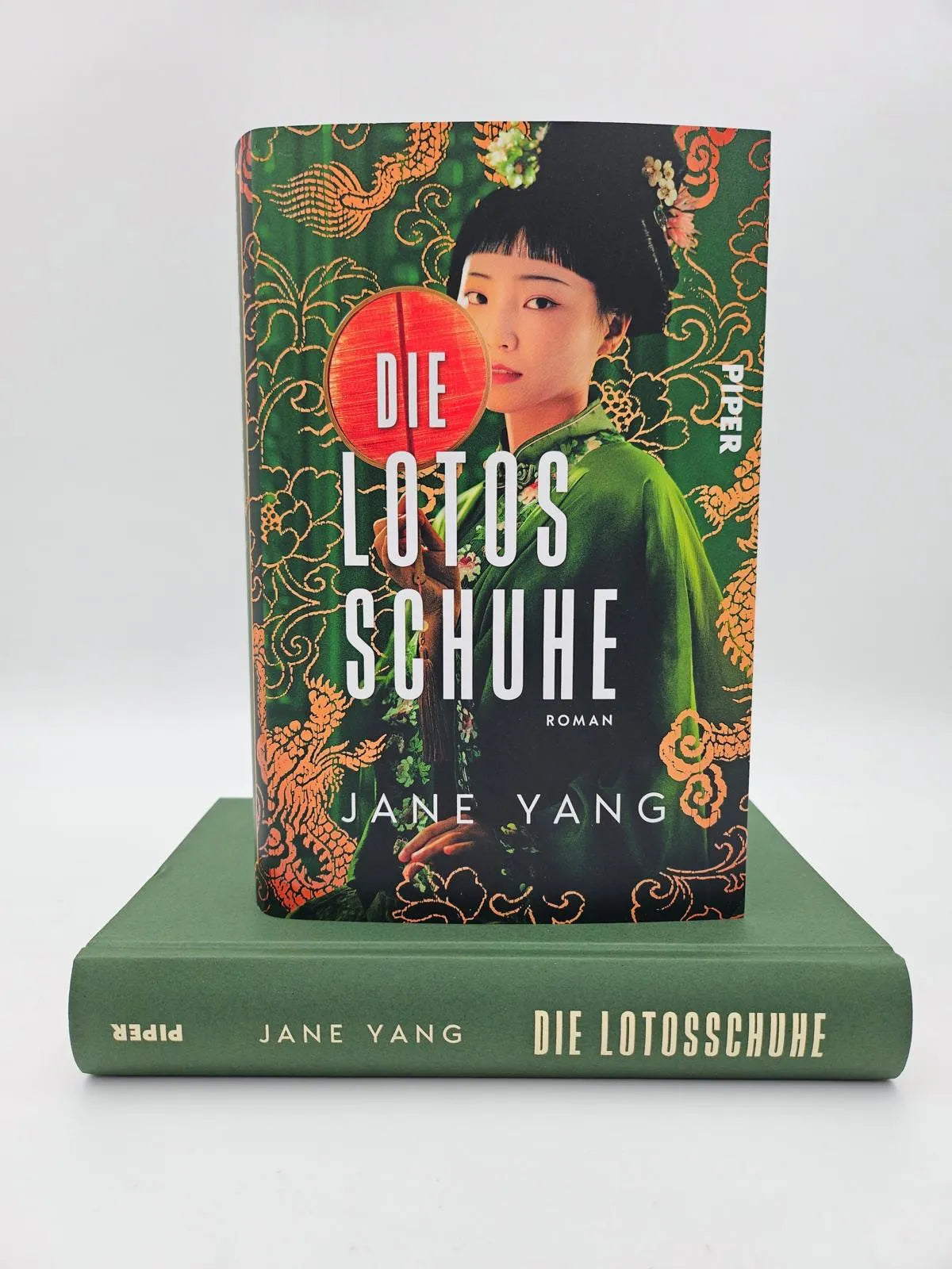 Produktansicht: Die Lotosschuhe (Gebundene Ausgabe)