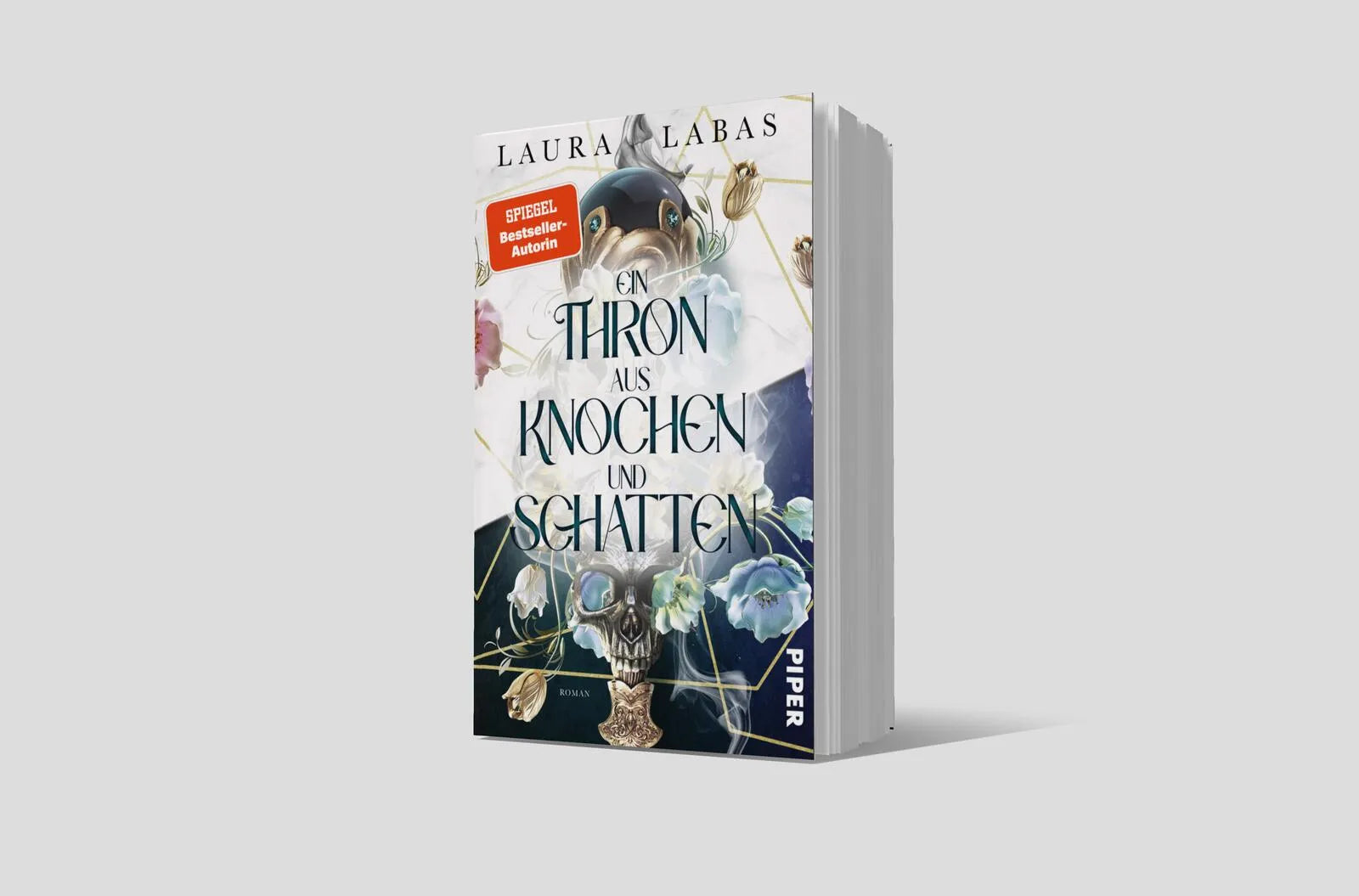 Produktansicht: Ein Thron aus Knochen und Schatten (Taschenbuch)