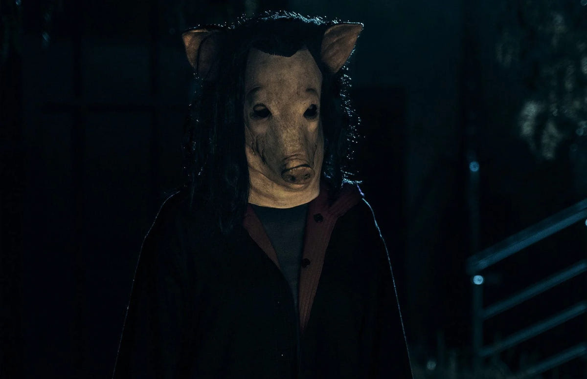 SAW X – Eine Gestalt mit Schweinemaske