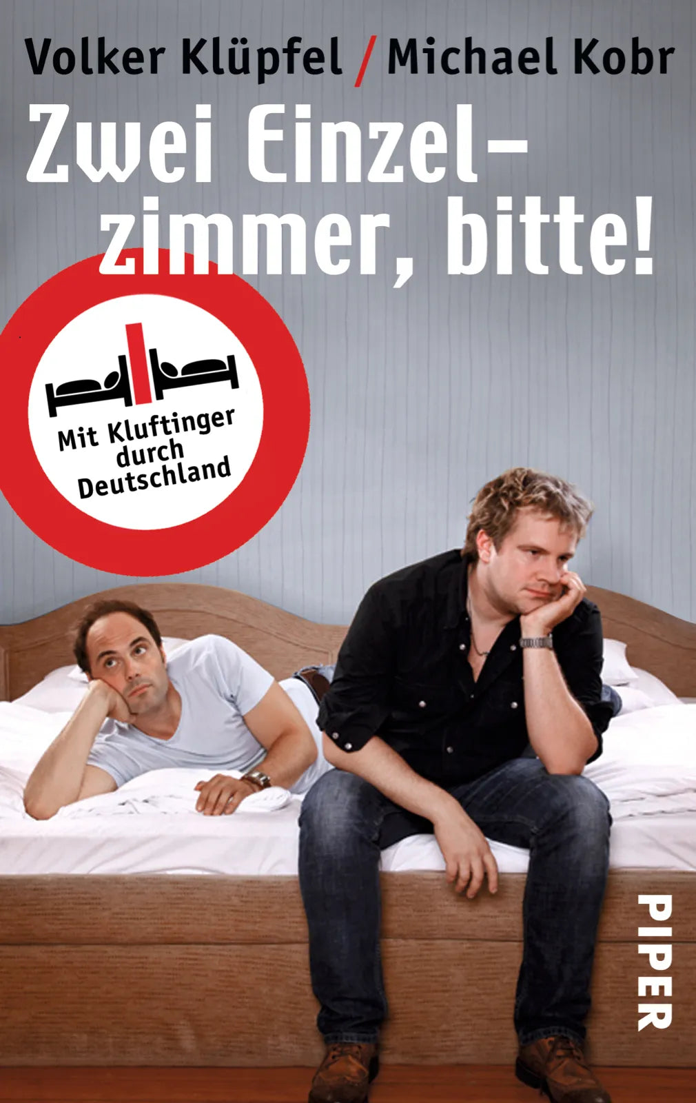 Buchcover von 'Zwei Einzelzimmer, bitte!' - Taschenbuch von Volker Klüpfel