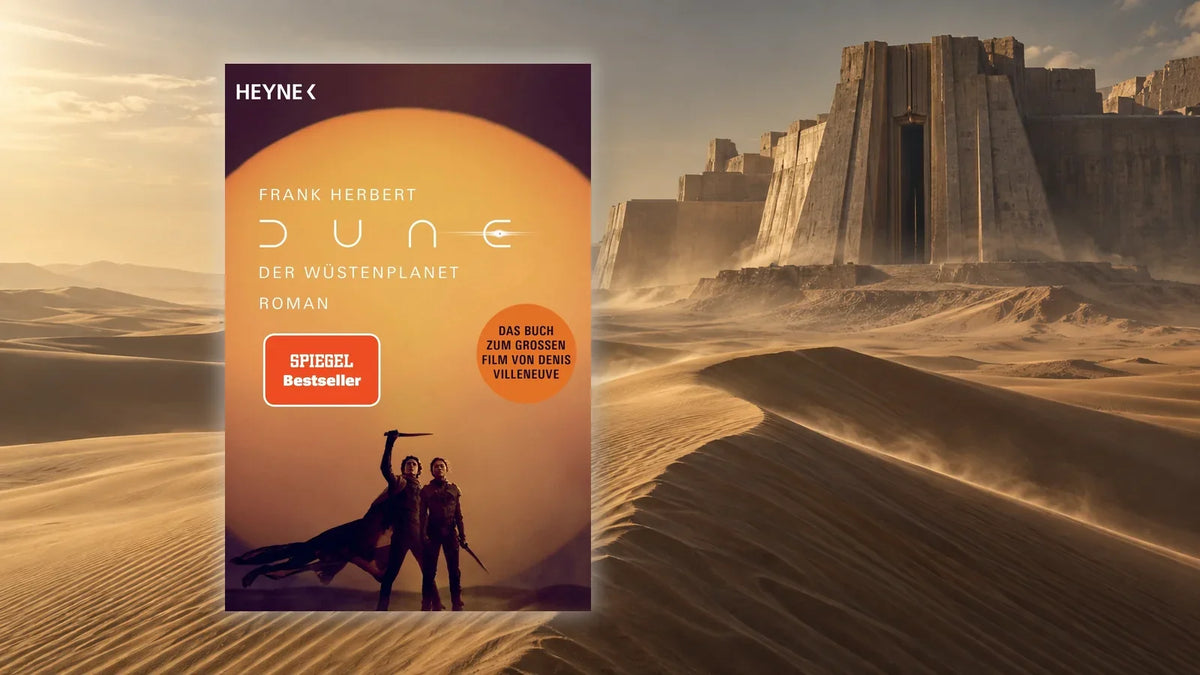 »Dune – Der Wüstenplanet« von Frank Herbert, Filmausgabe bei Heyne, vor windgepeitschten Sanddünen und einer monumentalen Wüstenzitadelle im Abendlicht