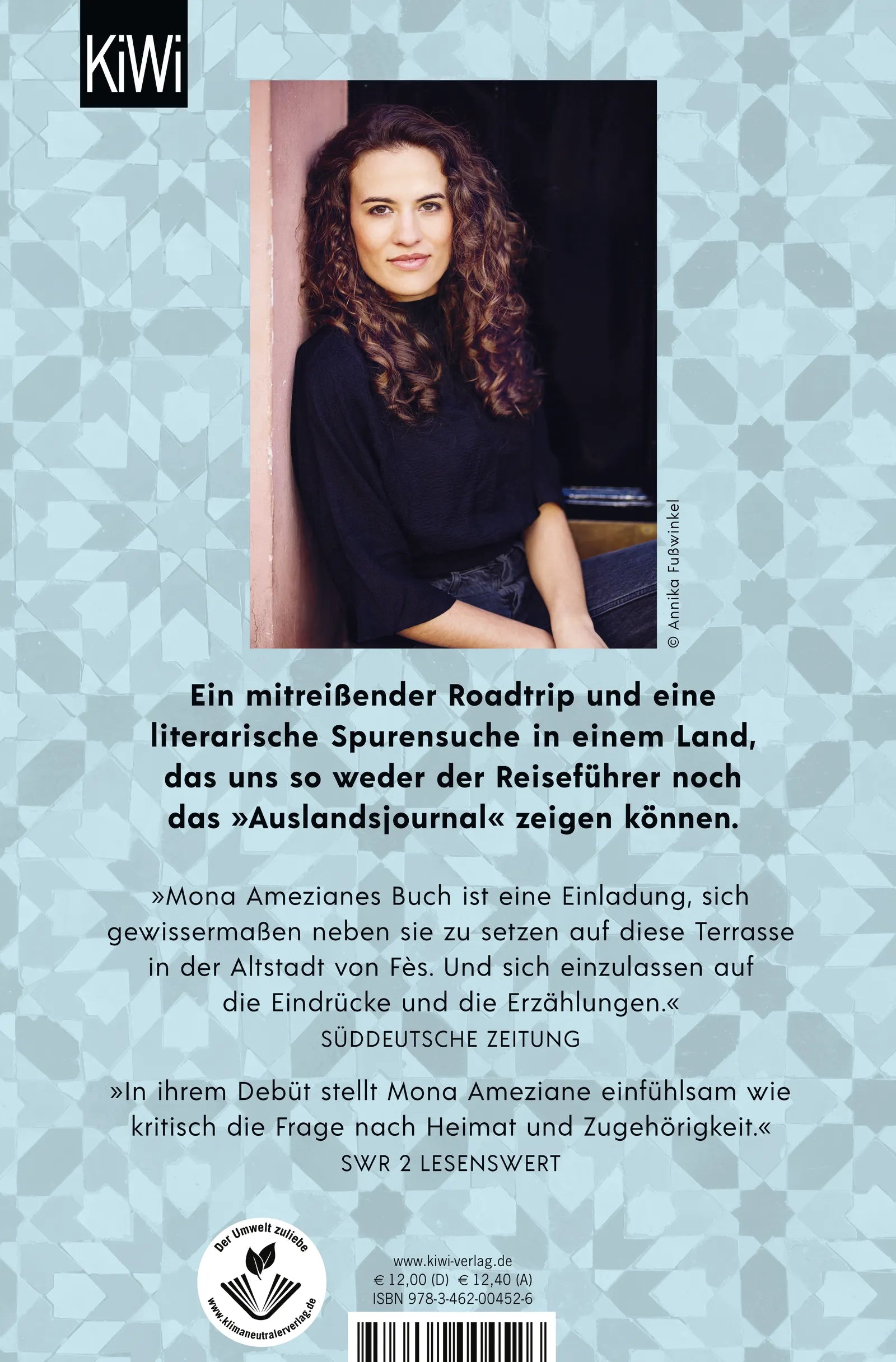 Buchrückseite von 'Auf Basidis Dach' mit Klappentext - Taschenbuch