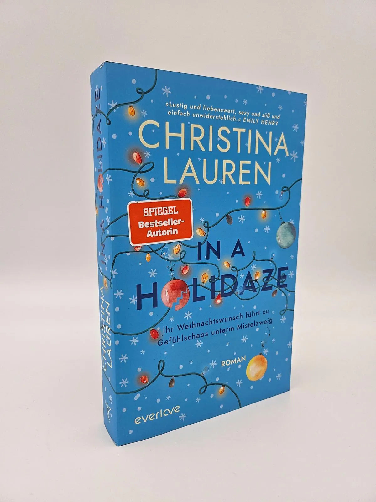 Produktansicht: In a Holidaze – Ihr Weihnachtswunsch führt zu Gefühlschaos unterm Mistelzweig (Paperback)
