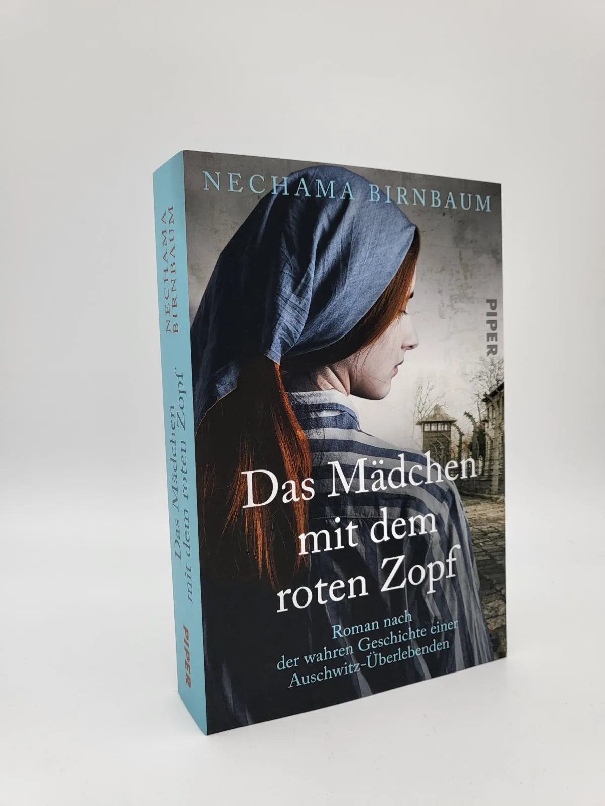 Abbildung von 'Das Mädchen mit dem roten Zopf'