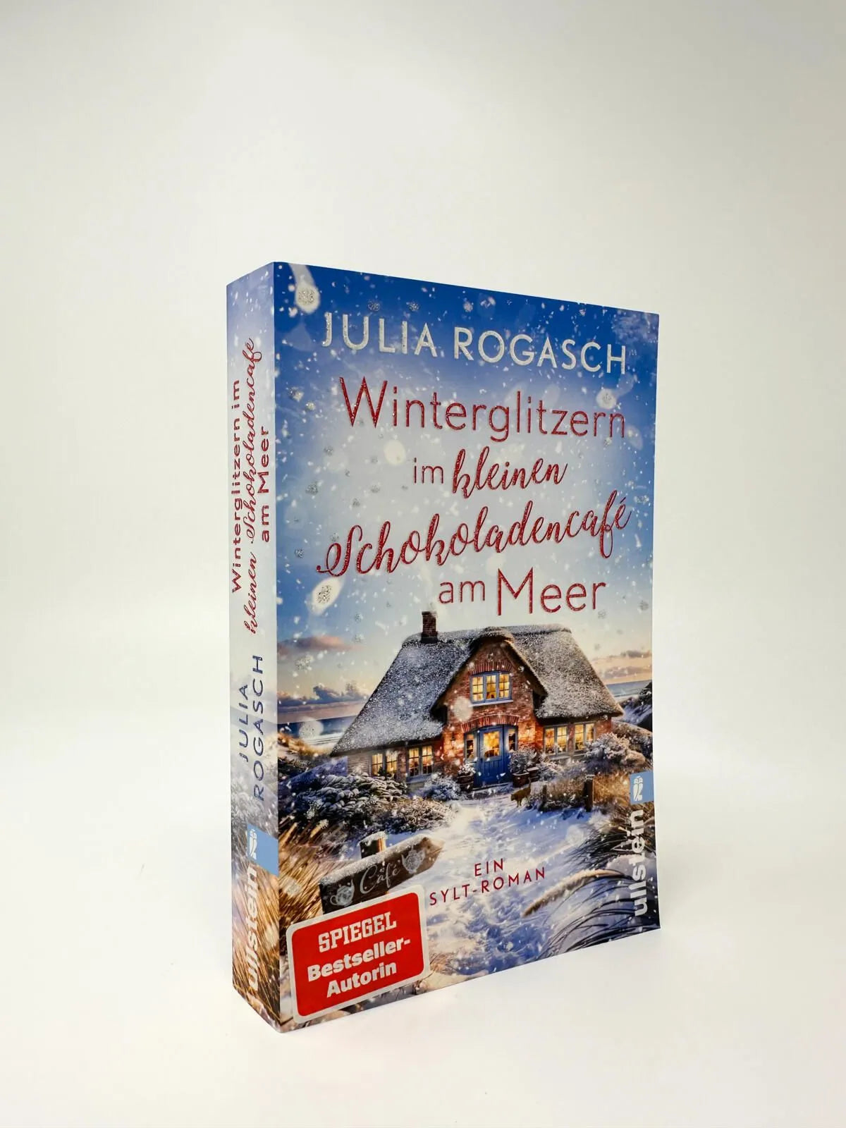 Detailansicht: Winterglitzern im kleinen Schokoladencafé am Meer (Taschenbuch)